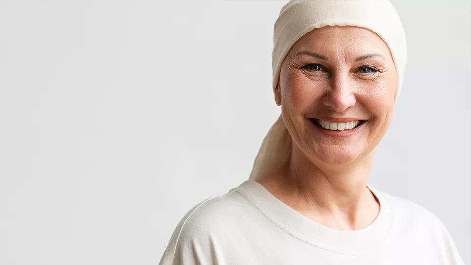 Woman smiling after chemotherapy